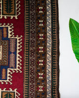 Vintage caucasian rug in a living room setting, pile rug, Turkish rug, vintage rug, portland, rug shop, bright colors, wild shaman, soft rug, bold color, Portland, Oregon, rug store, rug shop, local shop, soft rug, pastel colors, faded colors