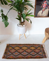 Vintage mini kilim rug in room decor setting, kilim, Turkish rug, vintage rug, portland, rug shop, bright colors, wild shaman, soft rug, bold color, Portland, Oregon, rug store, rug shop, local shop