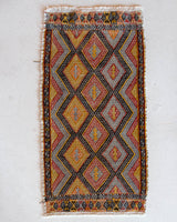 Vintage mini kilim rug in room decor setting, kilim, Turkish rug, vintage rug, portland, rug shop, bright colors, wild shaman, soft rug, bold color, Portland, Oregon, rug store, rug shop, local shop
