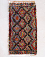 Vintage mini kilim rug in room decor setting, kilim, Turkish rug, vintage rug, portland, rug shop, bright colors, wild shaman, soft rug, bold color, Portland, Oregon, rug store, rug shop, local shop