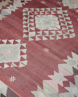 Vintage kilim rug in room decor setting, old rug, antique rug, pastel colors, faded colors, Turkish rug, vintage rug, soft rug, Portland, Oregon, rug store, rug shop, local shop, bold colors, bright colors, faded colors