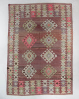Vintage kilim rug in living room setting, old rug, antique rug, pastel colors, faded colors, Turkish rug, vintage rug, soft rug, Portland, Oregon, rug store, rug shop, local shop, earthy tones, earthy colors, warm colorsVintage kilim rug in living room setting, old rug, antique rug, pastel colors, faded colors, Turkish rug, vintage rug, soft rug, Portland, Oregon, rug store, rug shop, local shop, earthy tones, earthy colors, warm colors