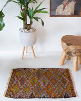 Vintage mini kilim rug in room decor setting, kilim, Turkish rug, vintage rug, portland, rug shop, bright colors, wild shaman, soft rug, bold color, Portland, Oregon, rug store, rug shop, local shop