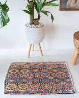 Vintage mini kilim rug in room decor setting, kilim, Turkish rug, vintage rug, portland, rug shop, bright colors, wild shaman, soft rug, bold color, Portland, Oregon, rug store, rug shop, local shop