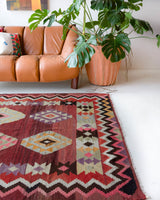 Vintage kilim rug in living room setting, bright colors, wild shaman, soft rug, bold color, Portland, Oregon, rug store, rug shop, local shop, vintage rug, modern kilim, warm