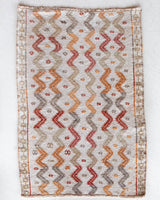 Vintage mini kilim rug in room decor setting, kilim, Turkish rug, vintage rug, portland, rug shop, bright colors, wild shaman, soft rug, bold color, Portland, Oregon, rug store, rug shop, local shop