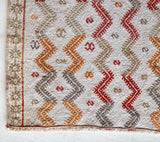 Vintage mini kilim rug in room decor setting, kilim, Turkish rug, vintage rug, portland, rug shop, bright colors, wild shaman, soft rug, bold color, Portland, Oregon, rug store, rug shop, local shop