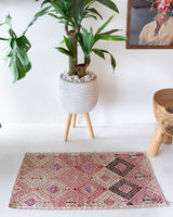 Vintage mini kilim rug in room decor setting, kilim, Turkish rug, vintage rug, portland, rug shop, bright colors, wild shaman, soft rug, bold color, Portland, Oregon, rug store, rug shop, local shop