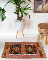 Vintage mini kilim rug in room decor setting, kilim, Turkish rug, vintage rug, portland, rug shop, bright colors, wild shaman, soft rug, bold color, Portland, Oregon, rug store, rug shop, local shop