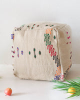 Floor pouf in a living room setting, pillow, turkish pillow, kilim pillow, home decor, decorative pillow, sham, rug pillow, decor, home decor, pouf, floor cushion, cushion, Portland, rugshop, Oregon, Wild Shaman, ottoman