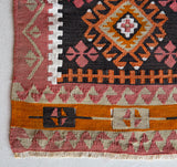 Vintage mini kilim rug in room decor setting, kilim, Turkish rug, vintage rug, portland, rug shop, bright colors, wild shaman, soft rug, bold color, Portland, Oregon, rug store, rug shop, local shop