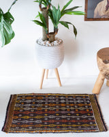 Vintage mini kilim rug in room decor setting, kilim, Turkish rug, vintage rug, portland, rug shop, bright colors, wild shaman, soft rug, bold color, Portland, Oregon, rug store, rug shop, local shop