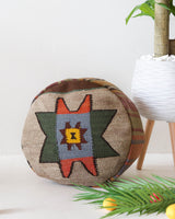 Floor pouf in a living room setting, pillow, turkish pillow, kilim pillow, home decor, decorative pillow, sham, rug pillow, decor, home decor, pouf, floor cushion, cushion, Portland, rugshop, Oregon, Wild Shaman, ottoman