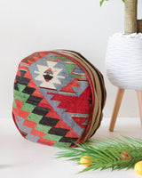 Floor pouf in a living room setting, pillow, turkish pillow, kilim pillow, home decor, decorative pillow, sham, rug pillow, decor, home decor, pouf, floor cushion, cushion, Portland, rugshop, Oregon, Wild Shaman, ottoman