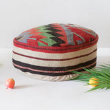 Floor pouf in a living room setting, pillow, turkish pillow, kilim pillow, home decor, decorative pillow, sham, rug pillow, decor, home decor, pouf, floor cushion, cushion, Portland, rugshop, Oregon, Wild Shaman, ottoman