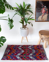 Vintage mini kilim rug in room decor setting, kilim, Turkish rug, vintage rug, portland, rug shop, bright colors, wild shaman, soft rug, bold color, Portland, Oregon, rug store, rug shop, local shop