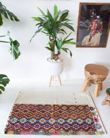 Vintage mini kilim rug in room decor setting, kilim, Turkish rug, vintage rug, portland, rug shop, bright colors, wild shaman, soft rug, bold color, Portland, Oregon, rug store, rug shop, local shop
