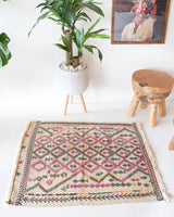 Vintage mini kilim rug in room decor setting, kilim, Turkish rug, vintage rug, portland, rug shop, bright colors, wild shaman, soft rug, bold color, Portland, Oregon, rug store, rug shop, local shop