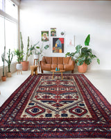 Vintage Turkish rug in a living room setting, pile rug, Turkish rug, vintage rug, portland, rug shop, bright colors, wild shaman, soft rug, bold color, Portland, Oregon, rug store, rug shop, local shop, antique rug