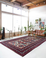 Vintage Turkish rug in a living room setting, pile rug, Turkish rug, vintage rug, portland, rug shop, bright colors, wild shaman, soft rug, bold color, Portland, Oregon, rug store, rug shop, local shop, antique rug