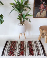 Vintage mini kilim rug in room decor setting, kilim, Turkish rug, vintage rug, portland, rug shop, bright colors, wild shaman, soft rug, bold color, Portland, Oregon, rug store, rug shop, local shop