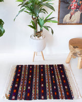 Vintage mini kilim rug in room decor setting, kilim, Turkish rug, vintage rug, portland, rug shop, bright colors, wild shaman, soft rug, bold color, Portland, Oregon, rug store, rug shop, local shop