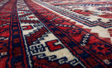 Vintage Turkish rug in a living room setting, pile rug, Turkish rug, vintage rug, portland, rug shop, bright colors, wild shaman, soft rug, bold color, Portland, Oregon, rug store, rug shop, local shop, antique rug