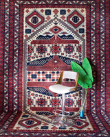 Vintage Turkish rug in a living room setting, pile rug, Turkish rug, vintage rug, portland, rug shop, bright colors, wild shaman, soft rug, bold color, Portland, Oregon, rug store, rug shop, local shop, antique rug