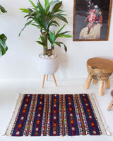 Vintage mini kilim rug in room decor setting, kilim, Turkish rug, vintage rug, portland, rug shop, bright colors, wild shaman, soft rug, bold color, Portland, Oregon, rug store, rug shop, local shop