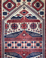 Vintage Turkish rug in a living room setting, pile rug, Turkish rug, vintage rug, portland, rug shop, bright colors, wild shaman, soft rug, bold color, Portland, Oregon, rug store, rug shop, local shop, antique rug