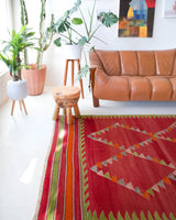 Vintage kilim rug in living room setting, bright colors, wild shaman, soft rug, bold color, Portland, Oregon, rug store, rug shop, local shop, vintage rug, modern kilim, warm colors