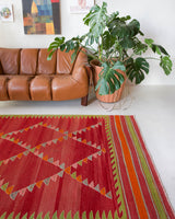 Vintage kilim rug in living room setting, bright colors, wild shaman, soft rug, bold color, Portland, Oregon, rug store, rug shop, local shop, vintage rug, modern kilim, warm colors