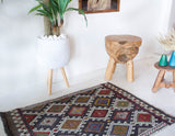 Vintage mini kilim rug in room decor setting, kilim, Turkish rug, vintage rug, portland, rug shop, bright colors, wild shaman, soft rug, bold color, Portland, Oregon, rug store, rug shop, local shop
