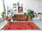 Vintage kilim rug in living room setting, bright colors, wild shaman, soft rug, bold color, Portland, Oregon, rug store, rug shop, local shop, vintage rug, modern kilim, warm colors