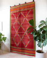 Vintage kilim rug in living room setting, bright colors, wild shaman, soft rug, bold color, Portland, Oregon, rug store, rug shop, local shop, vintage rug, modern kilim, warm colors