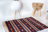 Vintage mini kilim rug in room decor setting, kilim, Turkish rug, vintage rug, portland, rug shop, bright colors, wild shaman, soft rug, bold color, Portland, Oregon, rug store, rug shop, local shop