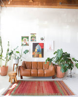 Vintage kilim rug in room decor setting, old rug, antique rug, pastel colors, faded colors, Turkish rug, vintage rug, soft rug, Portland, Oregon, rug store, rug shop, local shop, bold colors, bright colors, faded colors