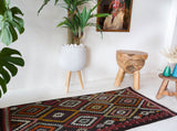 Vintage mini kilim rug in room decor setting, kilim, Turkish rug, vintage rug, portland, rug shop, bright colors, wild shaman, soft rug, bold color, Portland, Oregon, rug store, rug shop, local shop