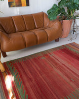 Vintage kilim rug in room decor setting, old rug, antique rug, pastel colors, faded colors, Turkish rug, vintage rug, soft rug, Portland, Oregon, rug store, rug shop, local shop, bold colors, bright colors, faded colors