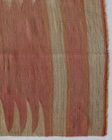 Vintage kilim rug in living room setting, old rug, antique rug, pastel colors, faded colors, Turkish rug, vintage rug, soft rug, Portland, Oregon, rug store, rug shop, local shop, earthy tones, earthy colors, warm colors