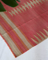 Vintage kilim rug in living room setting, old rug, antique rug, pastel colors, faded colors, Turkish rug, vintage rug, soft rug, Portland, Oregon, rug store, rug shop, local shop, earthy tones, earthy colors, warm colors