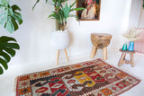 Vintage mini kilim rug in room decor setting, kilim, Turkish rug, vintage rug, portland, rug shop, bright colors, wild shaman, soft rug, bold color, Portland, Oregon, rug store, rug shop, local shop