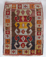 Vintage mini kilim rug in room decor setting, kilim, Turkish rug, vintage rug, portland, rug shop, bright colors, wild shaman, soft rug, bold color, Portland, Oregon, rug store, rug shop, local shop