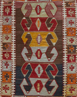 Vintage mini kilim rug in room decor setting, kilim, Turkish rug, vintage rug, portland, rug shop, bright colors, wild shaman, soft rug, bold color, Portland, Oregon, rug store, rug shop, local shop