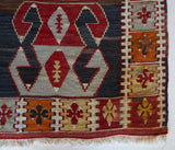 Vintage mini kilim rug in room decor setting, kilim, Turkish rug, vintage rug, portland, rug shop, bright colors, wild shaman, soft rug, bold color, Portland, Oregon, rug store, rug shop, local shop