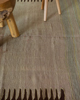 Vintage kilim rug in living room setting, old rug, antique rug, pastel colors, faded colors, Turkish rug, vintage rug, soft rug, Portland, Oregon, rug store, rug shop, local shop, earthy tones, earthy colors, warm colors