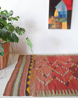 Vintage kilim rug in living room setting, bright colors, wild shaman, soft rug, bold color, Portland, Oregon, rug store, rug shop, local shop, vintage rug, modern kilim, warm colors