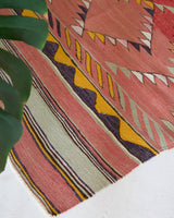 Vintage kilim rug in living room setting, bright colors, wild shaman, soft rug, bold color, Portland, Oregon, rug store, rug shop, local shop, vintage rug, modern kilim, warm colors