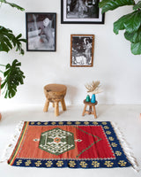 Vintage mini kilim rug in room decor setting, kilim, Turkish rug, vintage rug, portland, rug shop, bright colors, wild shaman, soft rug, bold color, Portland, Oregon, rug store, rug shop, local shop