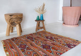 Vintage mini kilim rug in room decor setting, kilim, Turkish rug, vintage rug, portland, rug shop, bright colors, wild shaman, soft rug, bold color, Portland, Oregon, rug store, rug shop, local shop